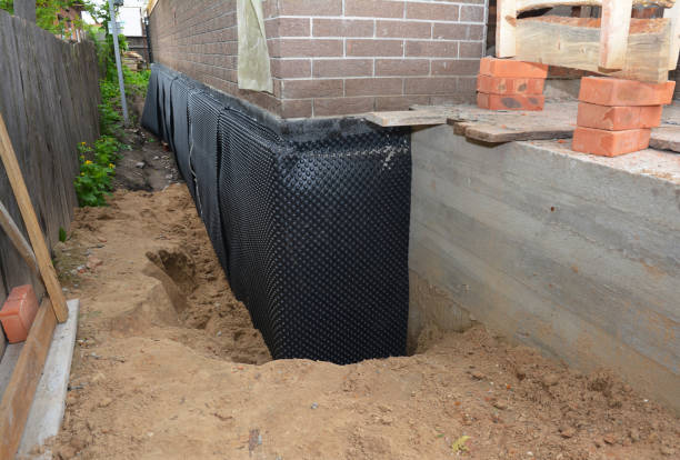 Happy homeowners after waterproofing job in Brooksville